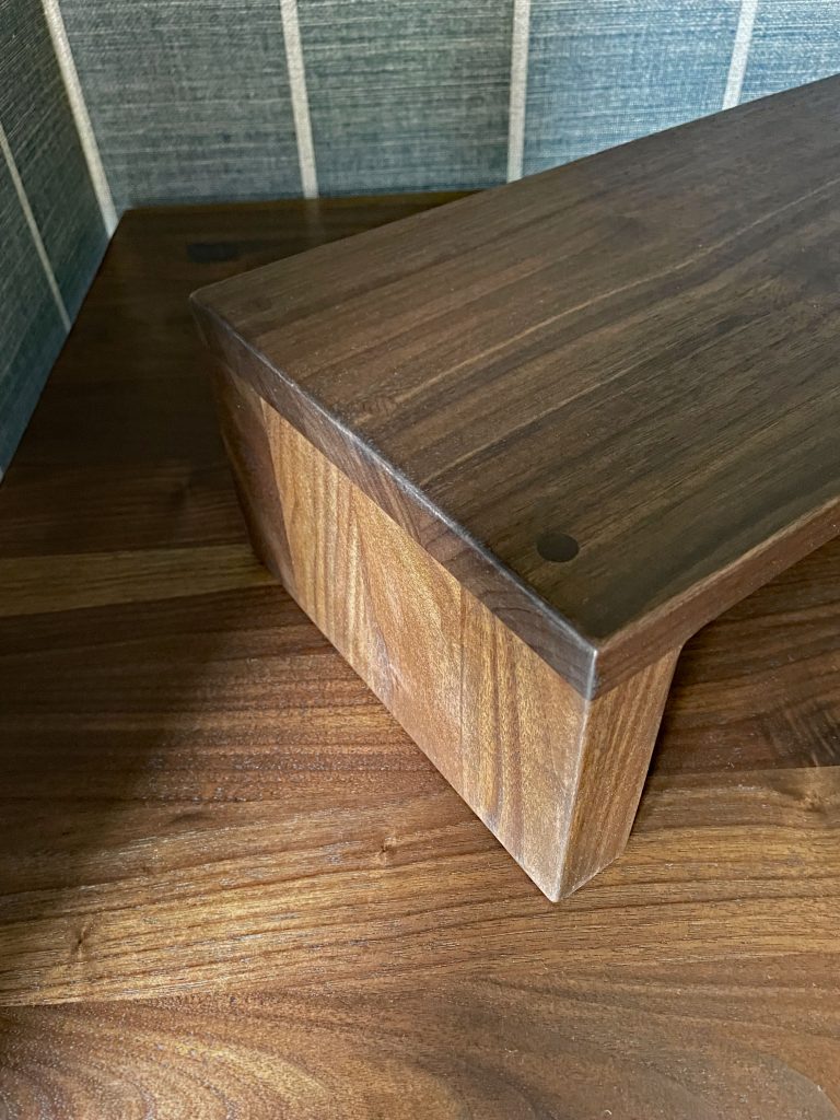 Walnut desktop with two monitor stands in walnut.