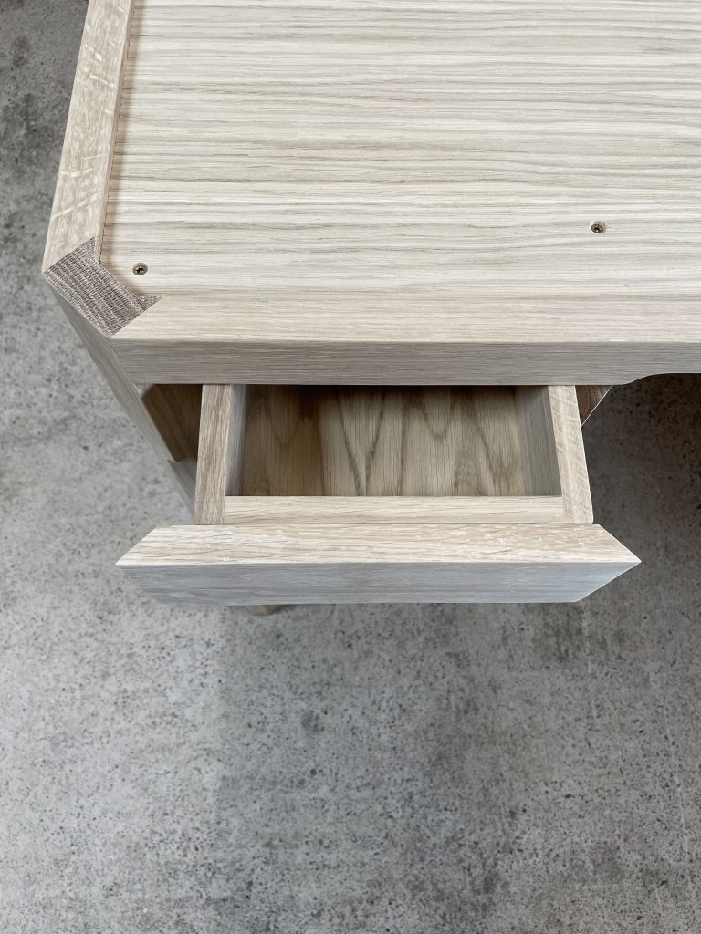 View of open drawer from above.