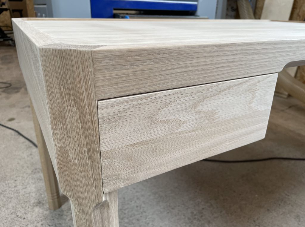 Detail of drawer front with 45 degree leg.