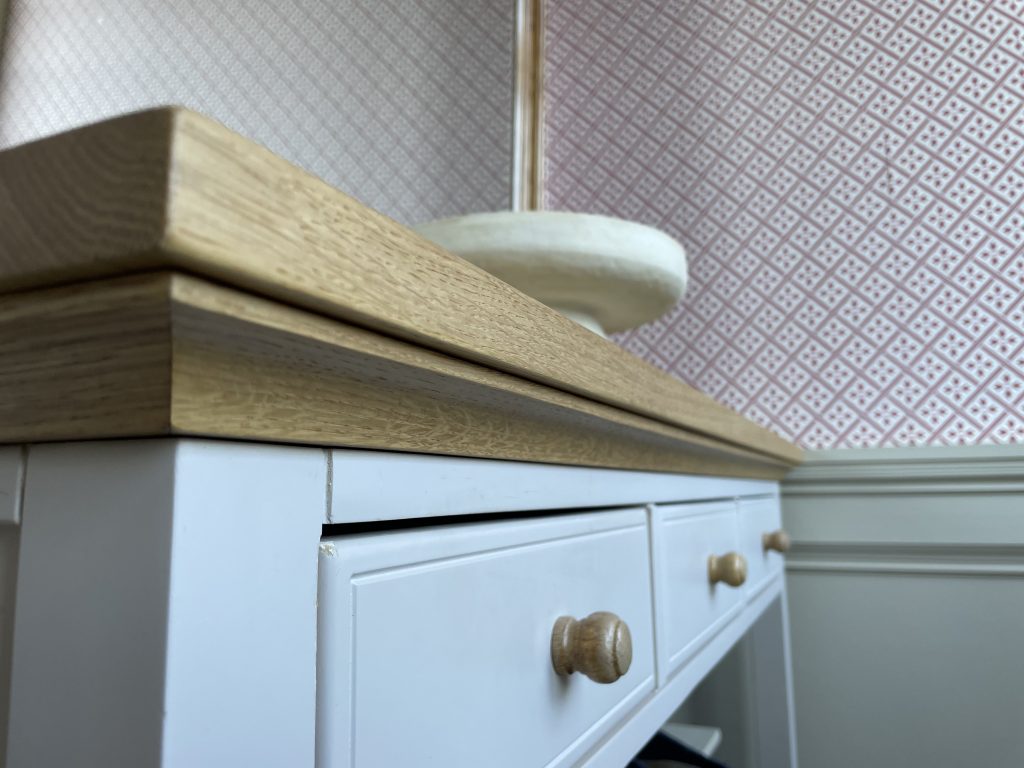 Close-up of solid oak moulding on table top by Chapelhill Fine Furniture.
