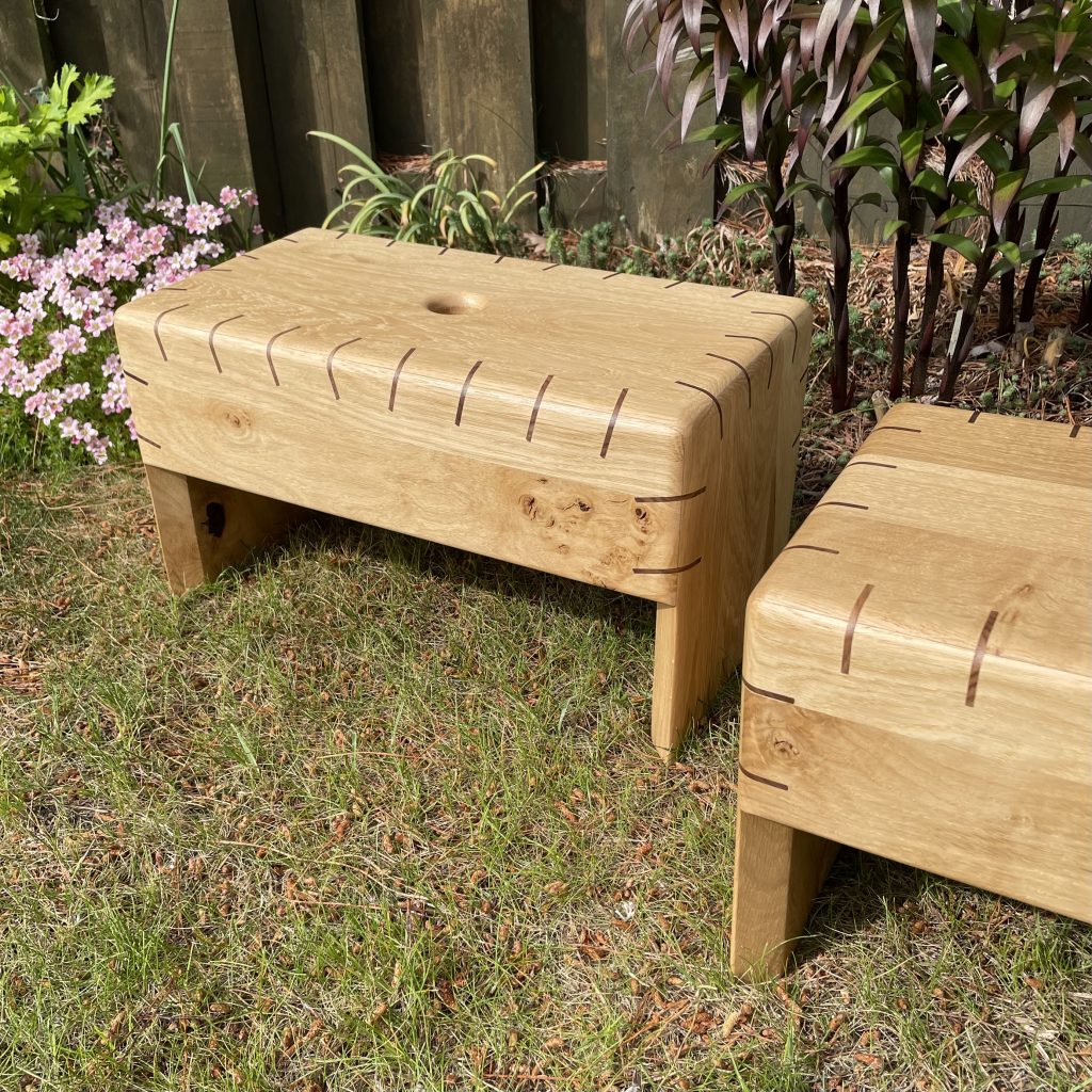 Frankenspline Scottish creepie stools in oak with walnut splines. Made by Iain Stirling of Chapelhill Fine Furniture.