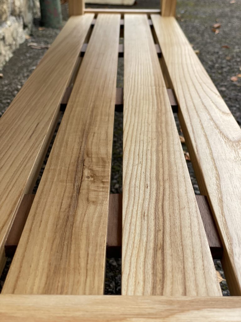 "Sparrow" bench and shoe rack made by Chapelhill Fine Furniture.